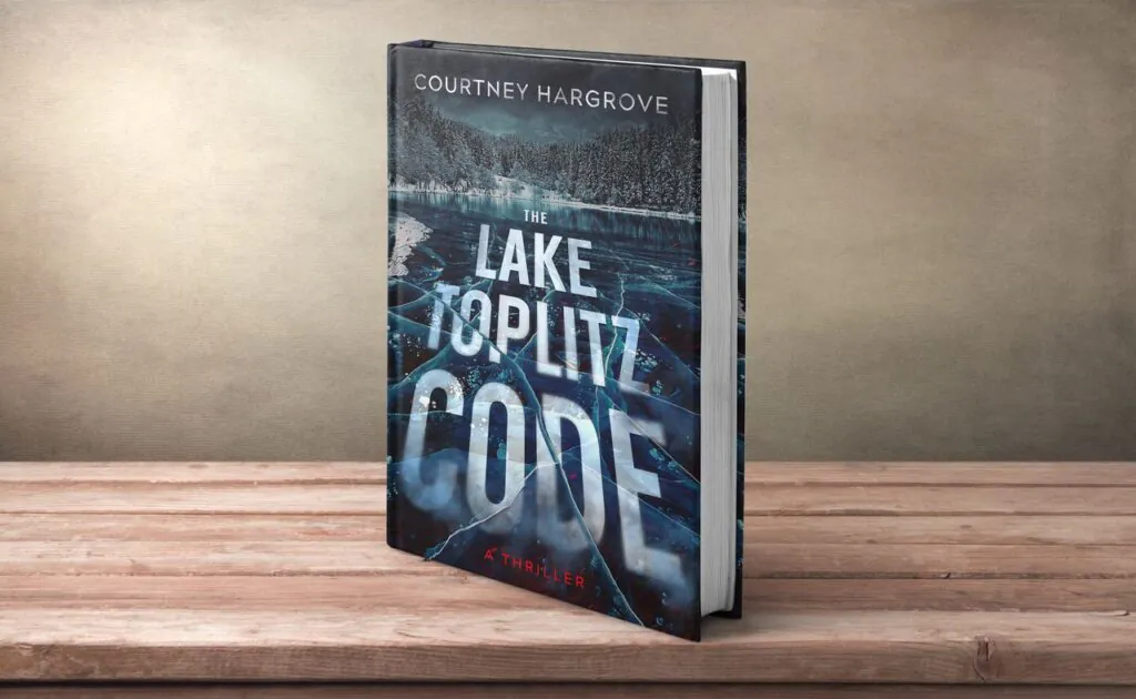 Spooky book cover design for The Lake Oplitz Code by Courtney Hargrove, featuring a frozen lake with deep cracks in the ice, a snow-covered forest in the background, and bold white typography creating a chilling thriller atmosphere.